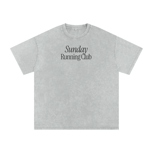 Grey t-shirt with 'Sunday Running Club' text on a white background